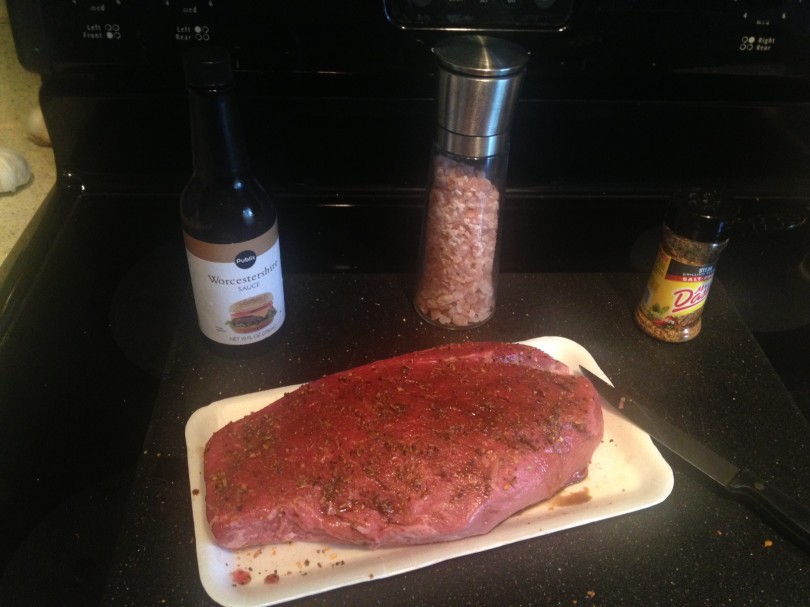 Add salt, mrs dash, and any sauce you want to a big slab of beef. This one was $10 for a little over 2 pounds.  