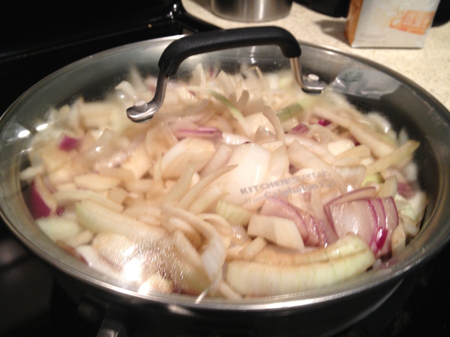 add all the onions and start cooking down [add a lid]