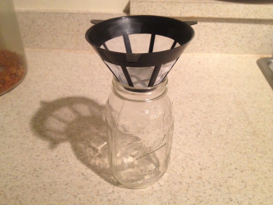 Get another large mason jar and reusable coffee filter like this one