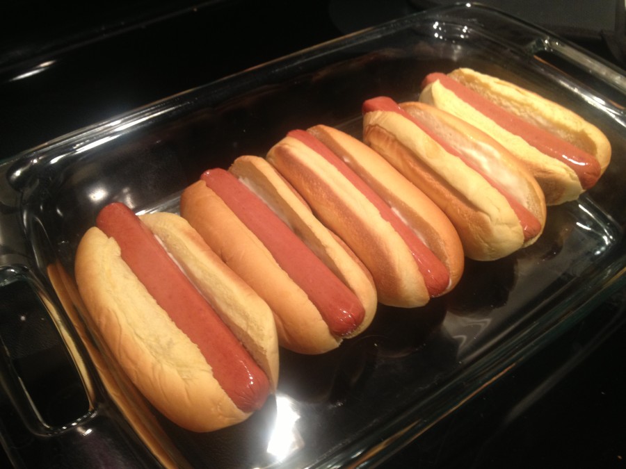 Add your dogs straight out of the package into the now slightly crispy buns